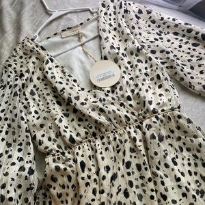 NWT. Small could fit medium. Short dress